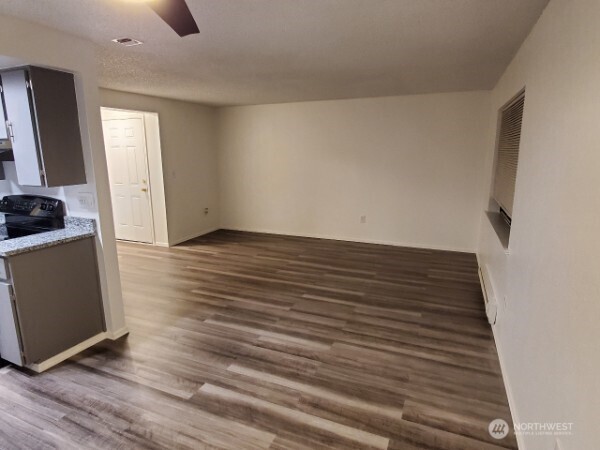 105 96th Street East Tacoma, WA 98445 - Photo 32 of 40 wooden floor in an empty room