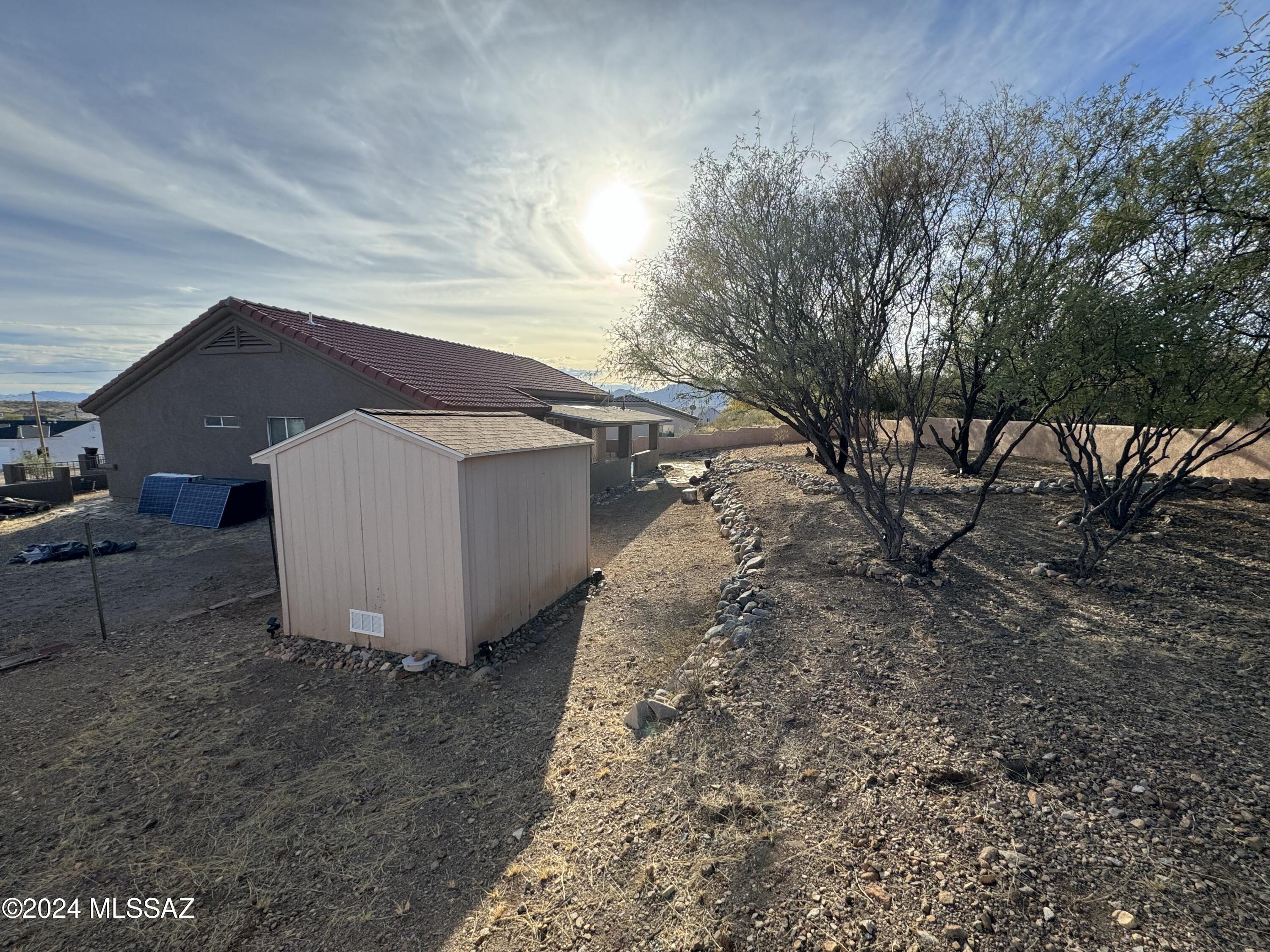 1841 America Court Rio Rico, AZ 85648 - Photo 32 of 38 a view of a house with a yard