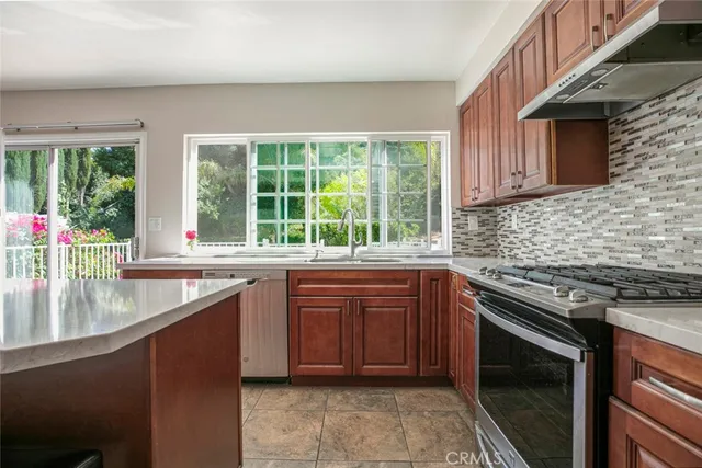 wooden floor in a hall with an empty room