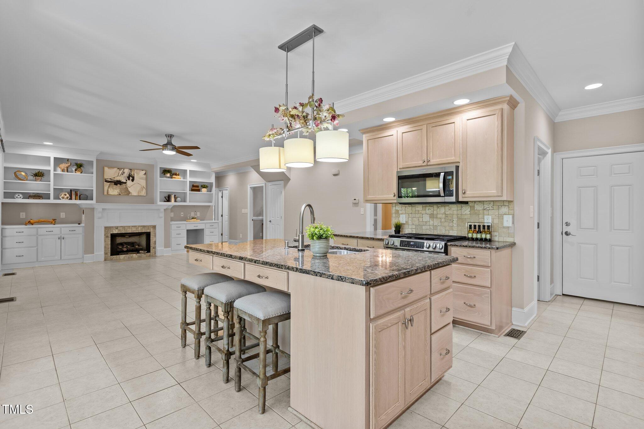 3600 Trail 23 Durham, NC 27707 - Photo 12 of 68 a kitchen with cabinets and chairs
