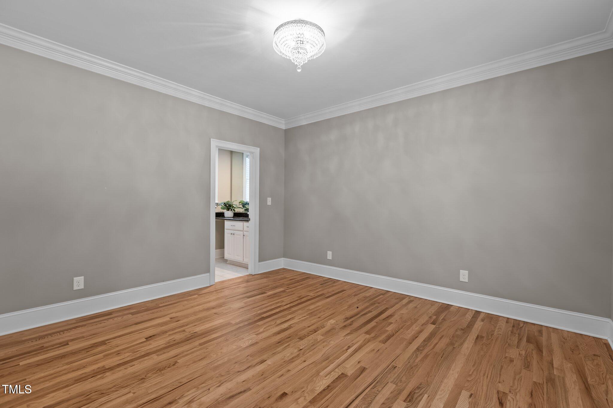 3600 Trail 23 Durham, NC 27707 - Photo 19 of 68 wooden floor in an empty room with a window