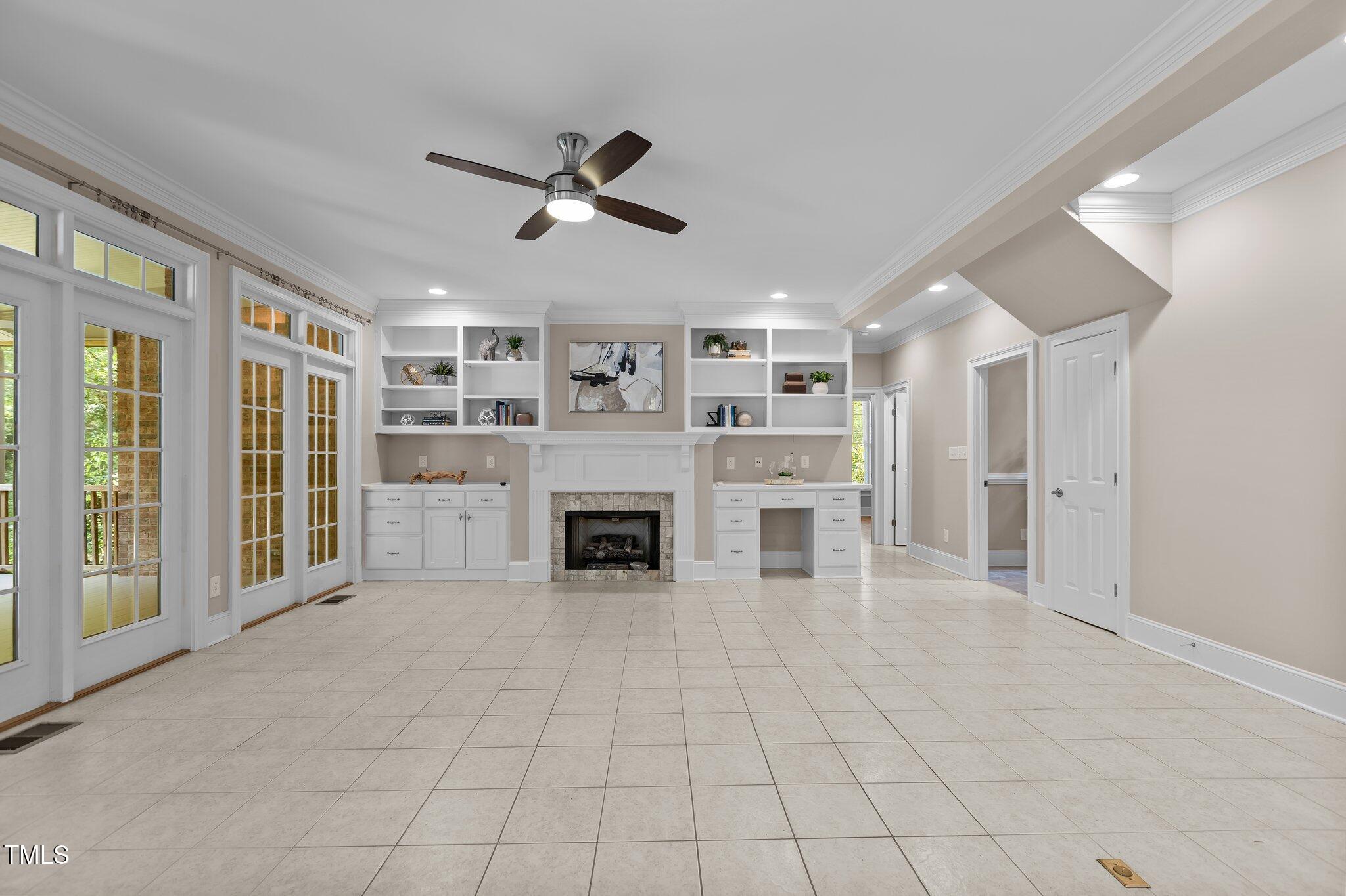3600 Trail 23 Durham, NC 27707 - Photo 21 of 68 a view of an empty room with fireplace and windows