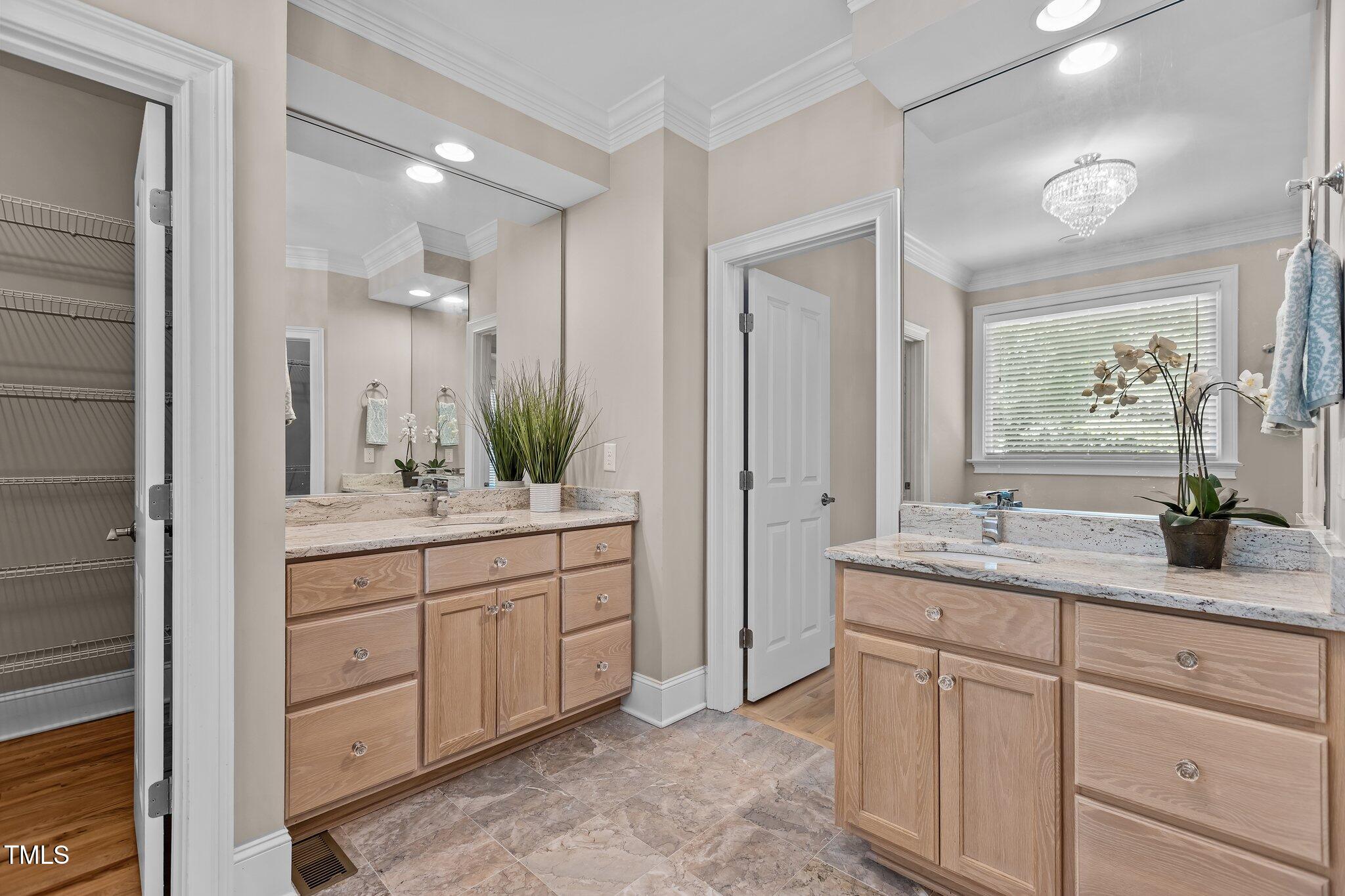 3600 Trail 23 Durham, NC 27707 - Photo 25 of 68 a bathroom with a granite countertop sink and a mirror