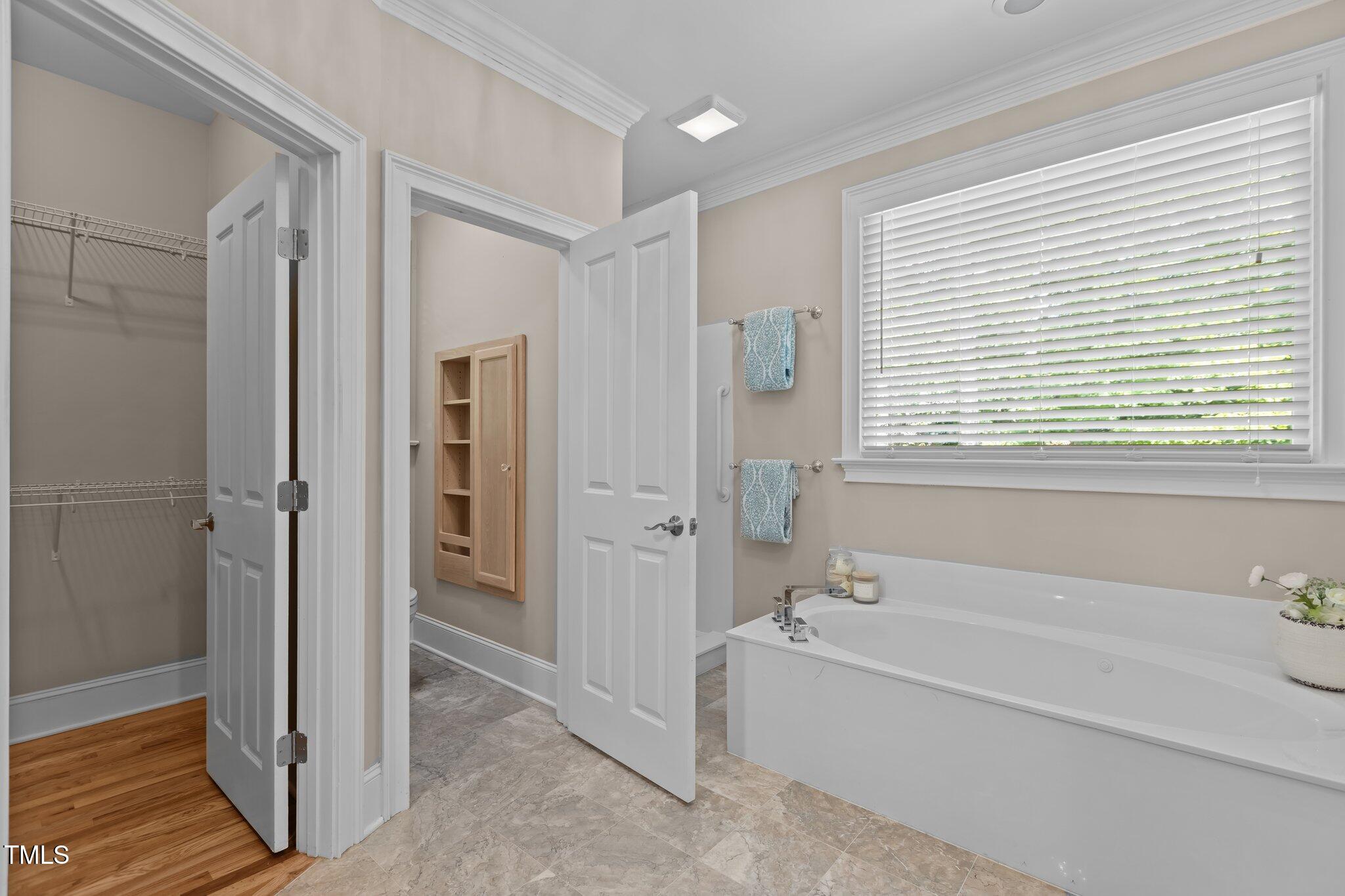 3600 Trail 23 Durham, NC 27707 - Photo 27 of 68 a spacious bathroom with a bathtub and a shower