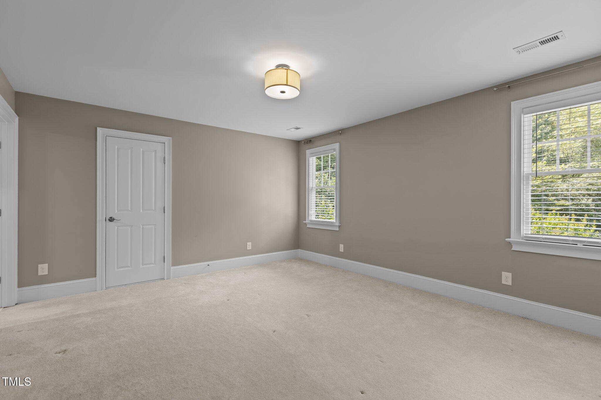 3600 Trail 23 Durham, NC 27707 - Photo 34 of 68 a view of an empty room with a window