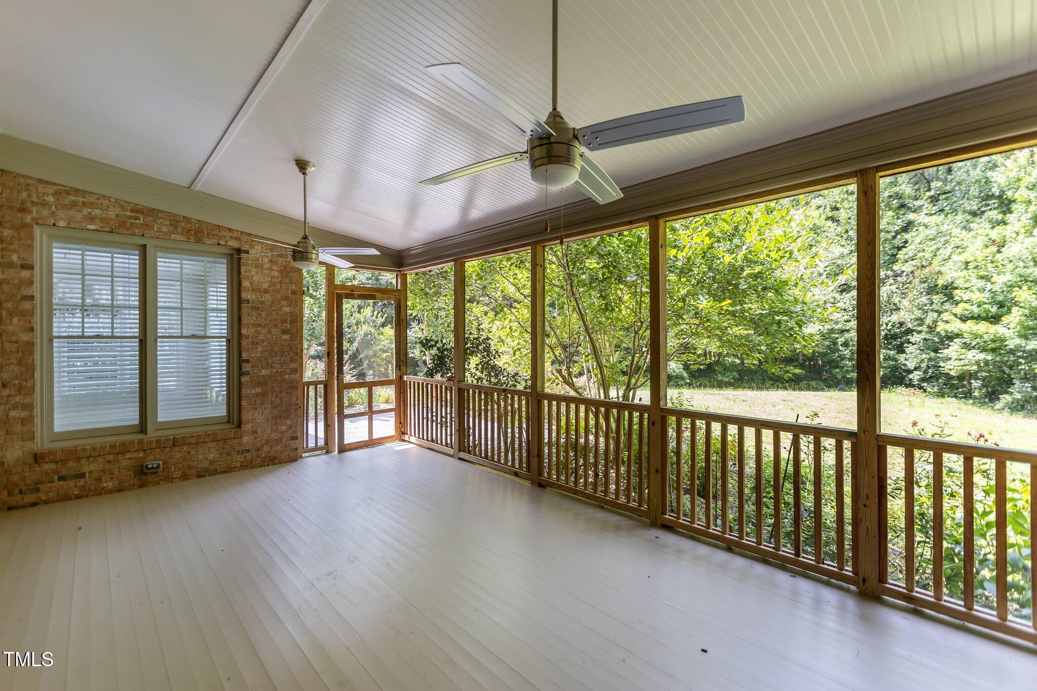 3600 Trail 23 Durham, NC 27707 - Photo 50 of 68 an empty room with wooden floor and windows