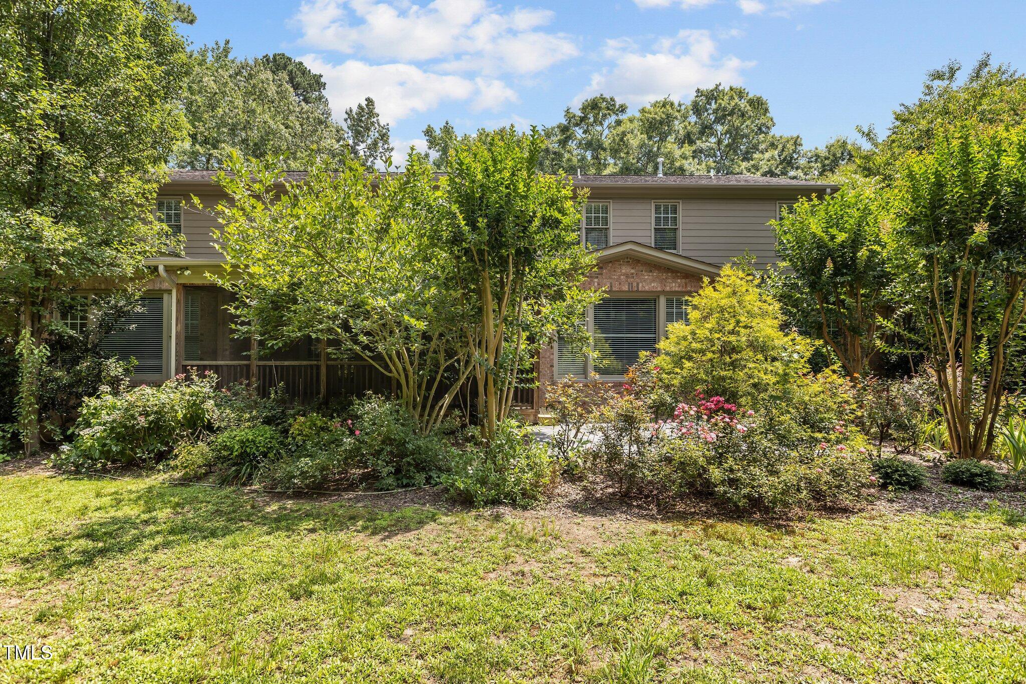 3600 Trail 23 Durham, NC 27707 - Photo 56 of 68 front view of a house with a yard