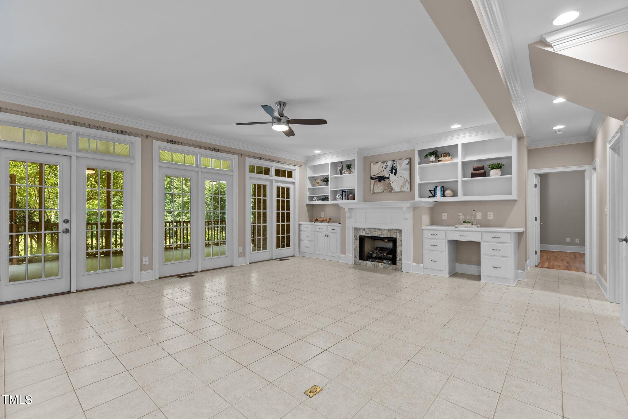 3600 Trail 23 Durham, NC 27707 - Photo 8 of 68 a view of a livingroom with a fireplace and large windows