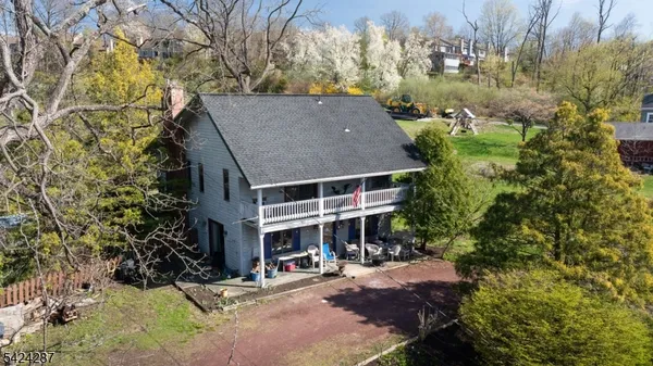 a view of house with outdoor space