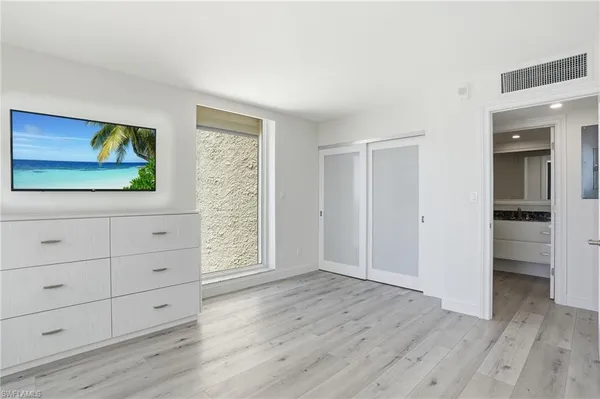 a view of livingroom with wooden floor