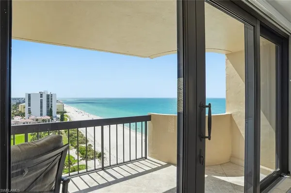 a view of balcony with patio