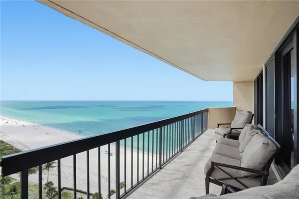 a balcony with view of ocean