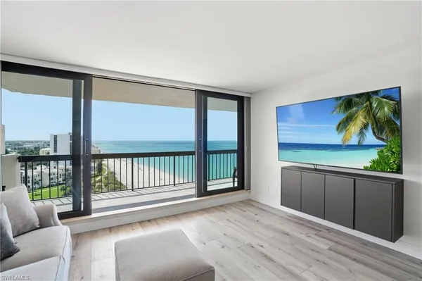 a view of livingroom with furniture and window