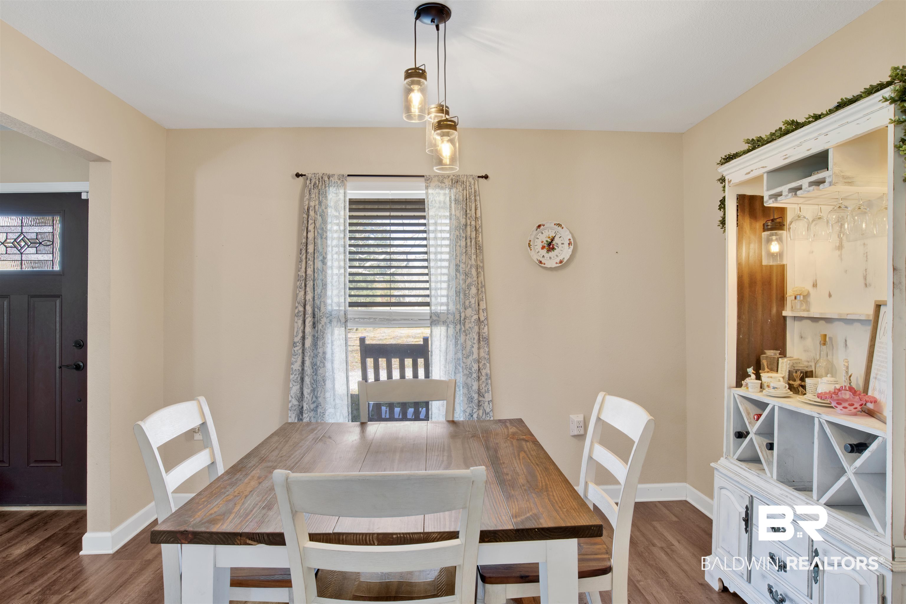 13676 Styx River Road Stapleton, AL 36578 - Photo 13 of 30 Dining room featuring dark wood-type flooring