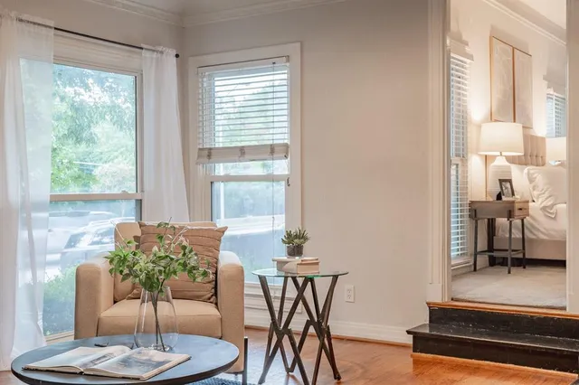 a view of a dining room with furniture window and outside view