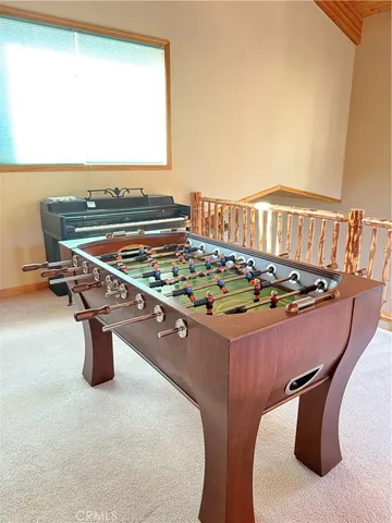 a balcony with view of wooden floor