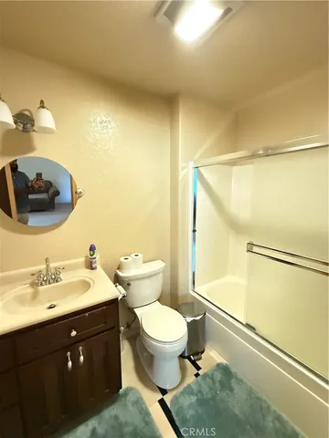 a front view of house with yard and entertaining space