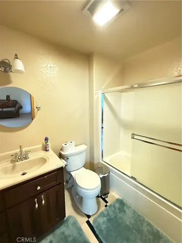 a view of a car parked on the side of the road