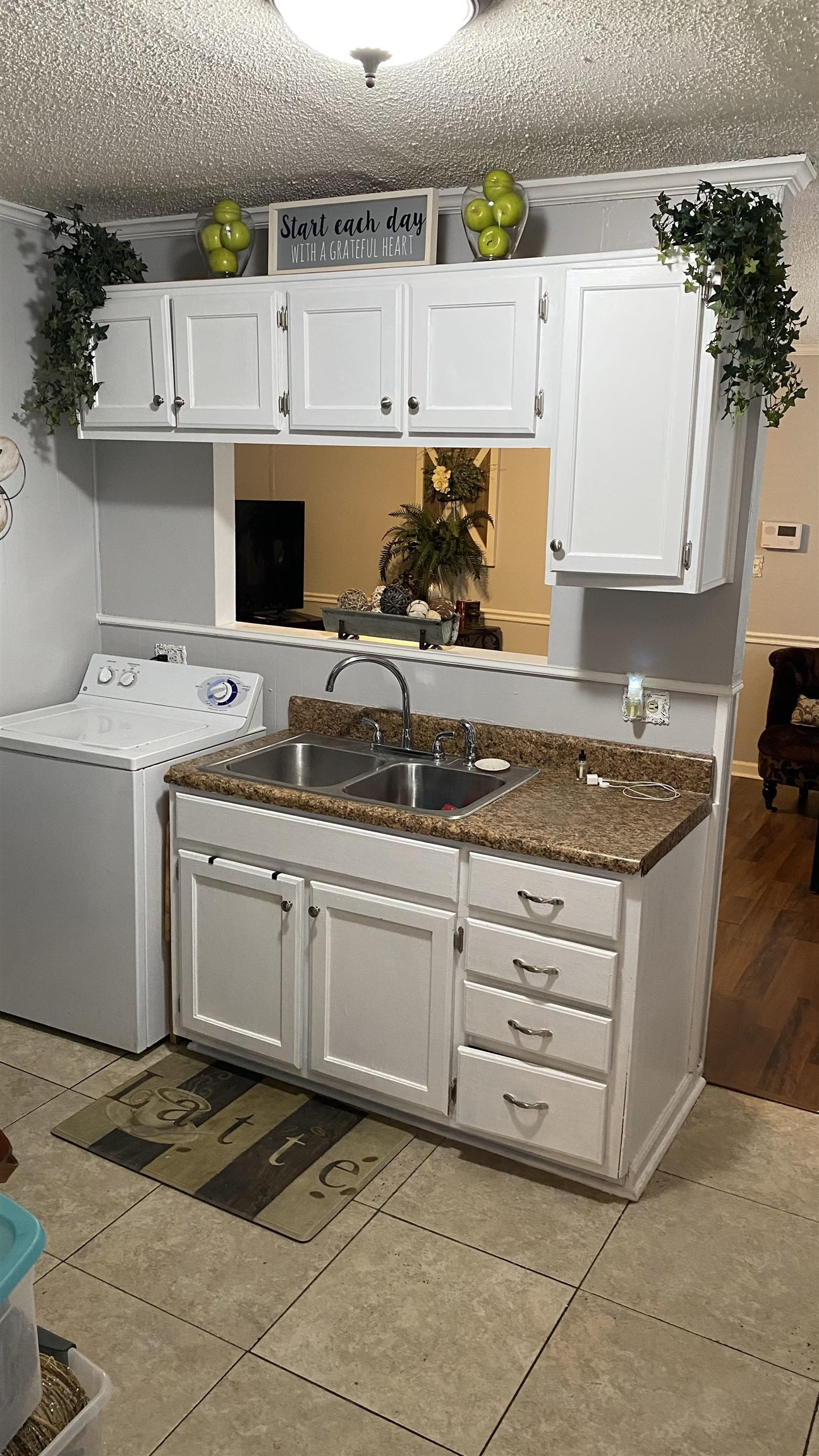 3019 Danville Road Memphis, TN 38118 - Photo 5 of 17 Cozy kitchen with white appliances. Opens to the living room so you can watch TV while you cook and do the dishes.
