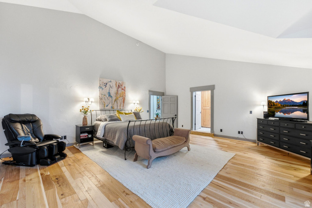 8650 Redden Road Park City, UT 84098 - Photo 18 of 71 Vaulted ceiling, light wood-finish flooring, recessed lighting, and white walls