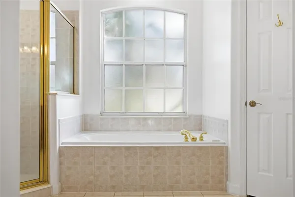 a view of a kitchen with granite countertop cabinets and a fireplace