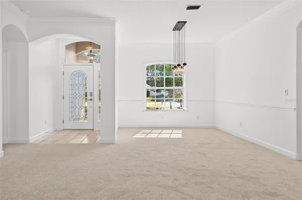 a kitchen with stainless steel appliances granite countertop a sink stove and microwave