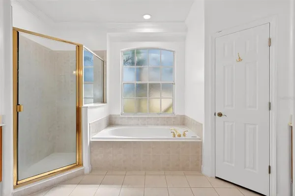 a view of a swimming pool with a lounge chair