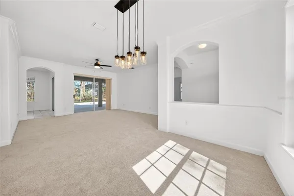 a bathroom with bathtub window and shower