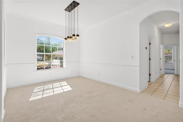 a bath tub sitting next to a window