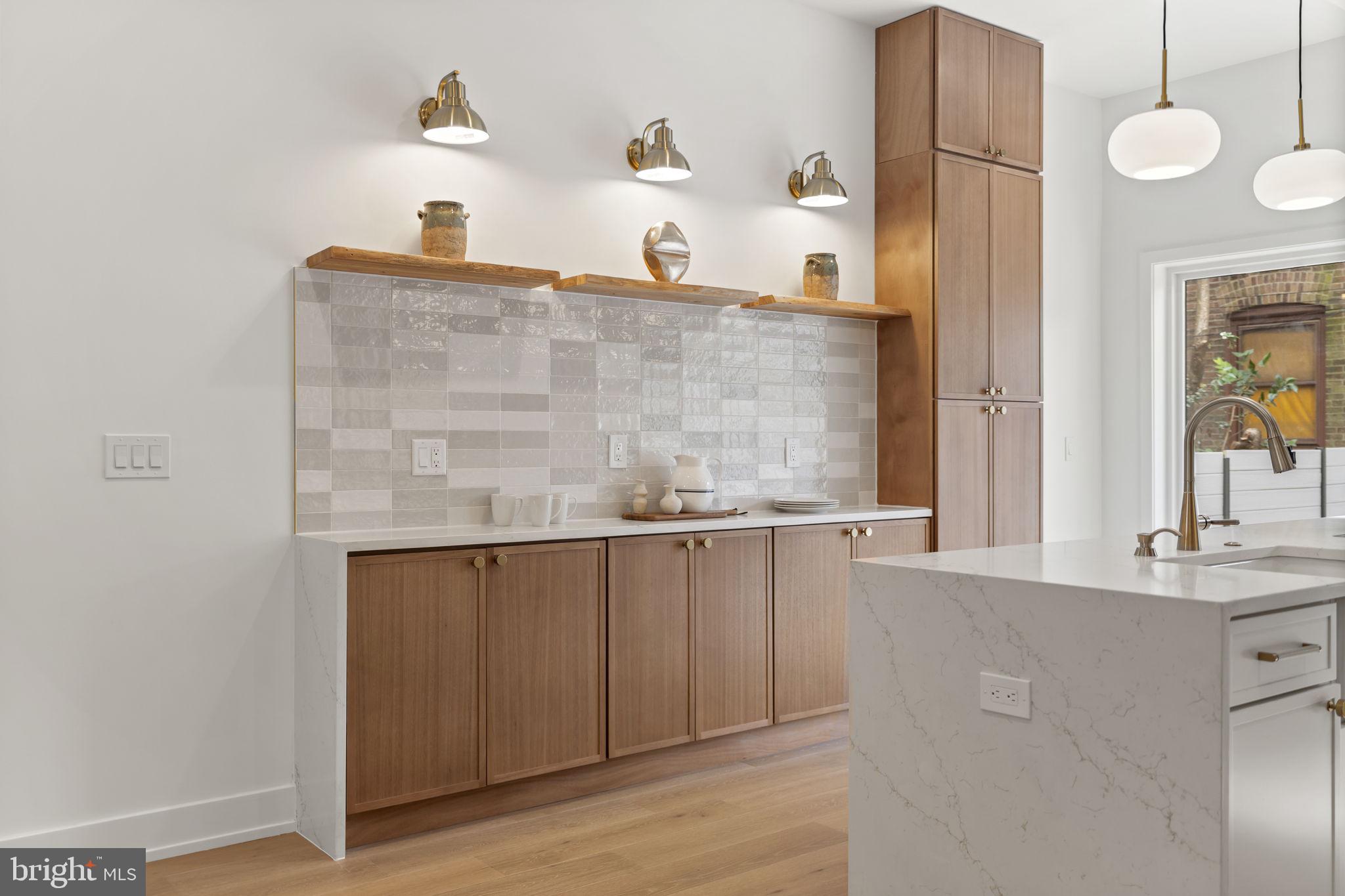 503 Winton Street Philadelphia, PA 19148 - Photo 19 of 65 a bathroom with a sink and a mirror