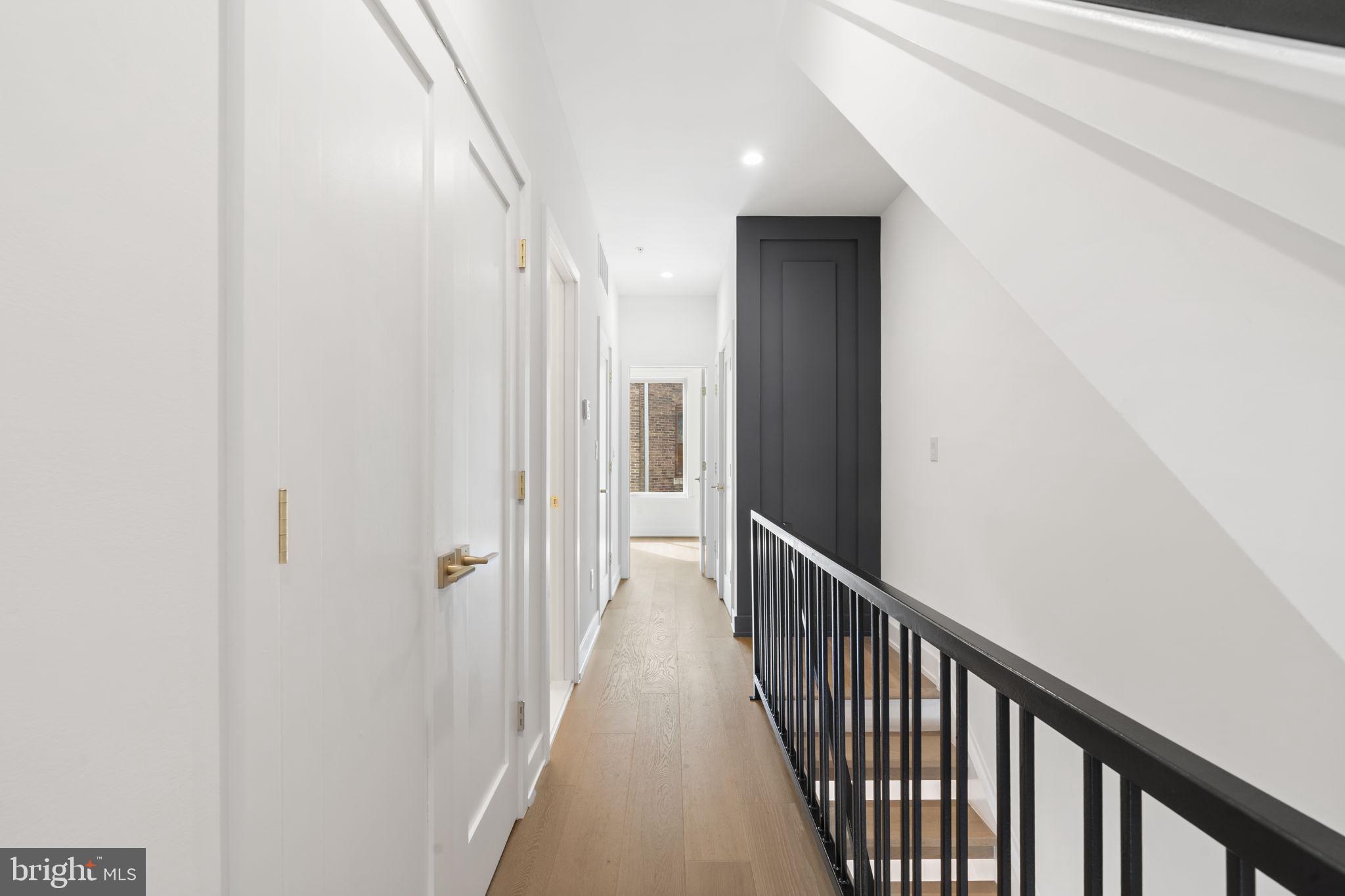 503 Winton Street Philadelphia, PA 19148 - Photo 25 of 65 a view of a hallway with the wooden floor