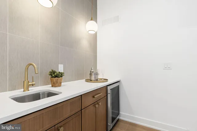 a view of a balcony with wooden floor and stairs