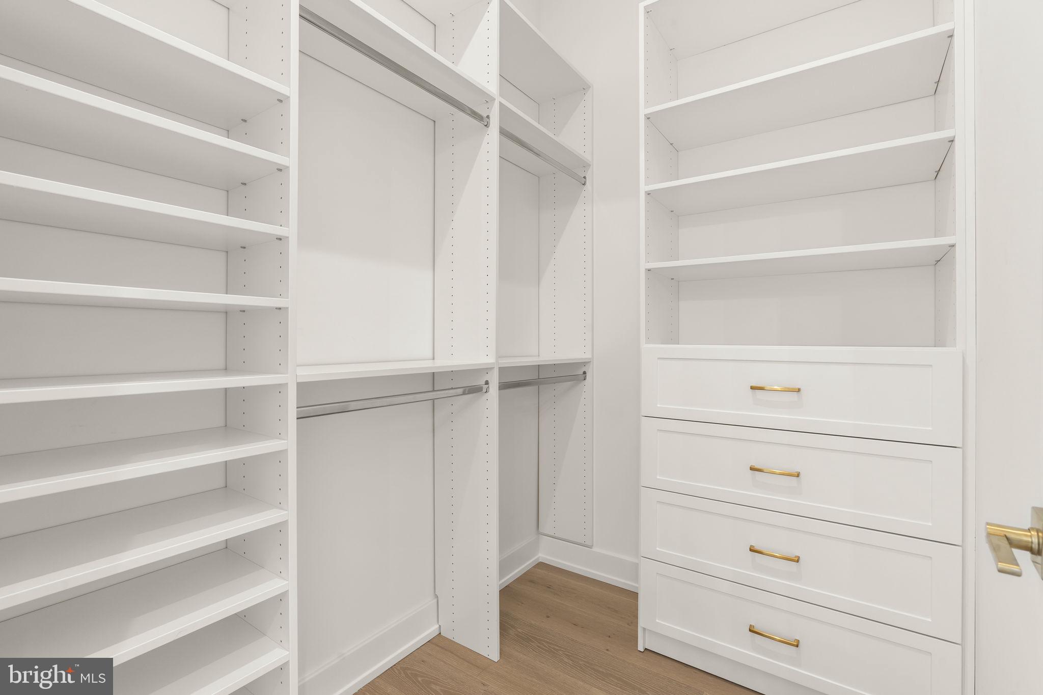 503 Winton Street Philadelphia, PA 19148 - Photo 43 of 65 a view of walk in closet with empty racks