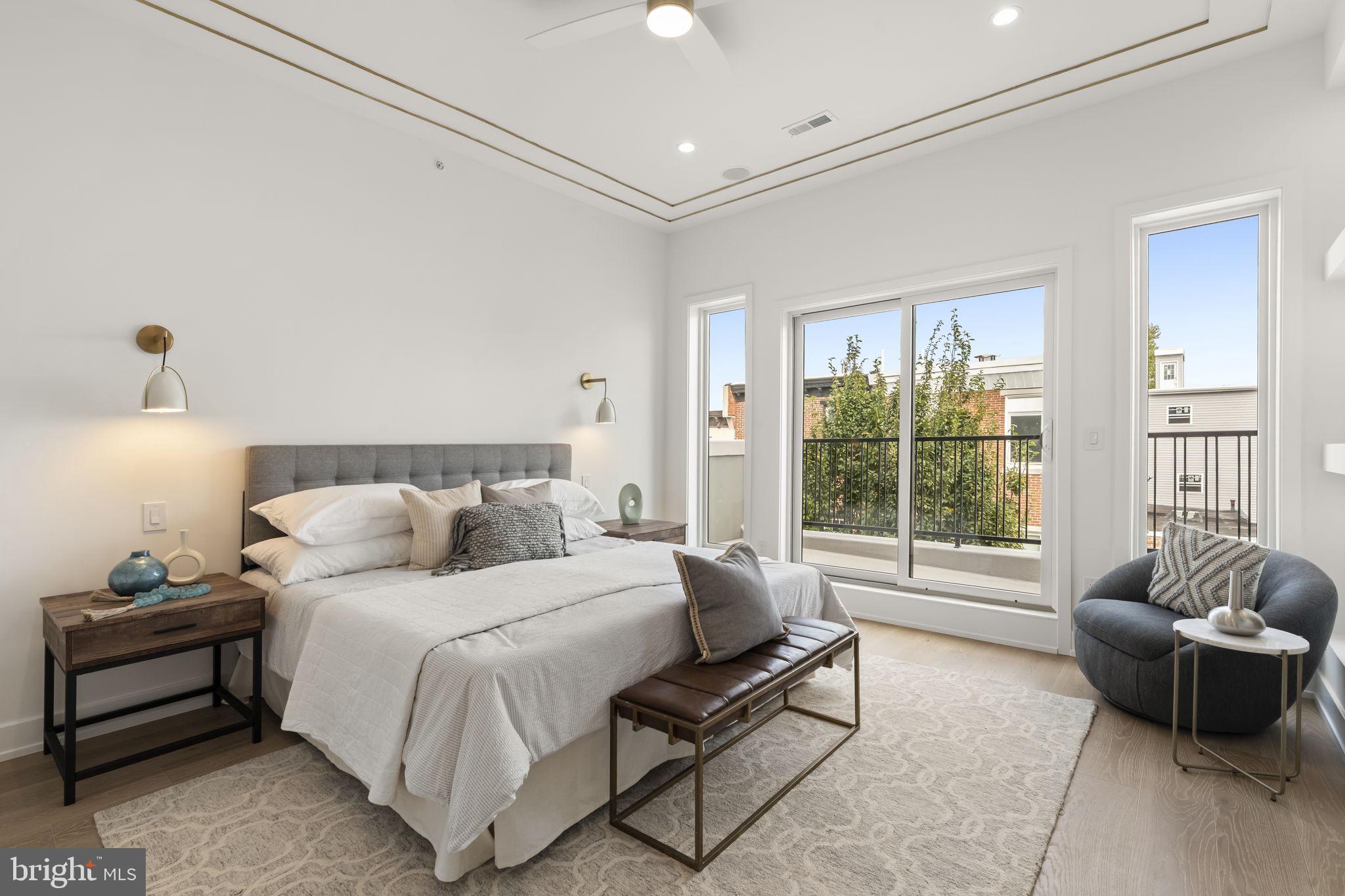 503 Winton Street Philadelphia, PA 19148 - Photo 48 of 65 a bedroom with a bed and a couch