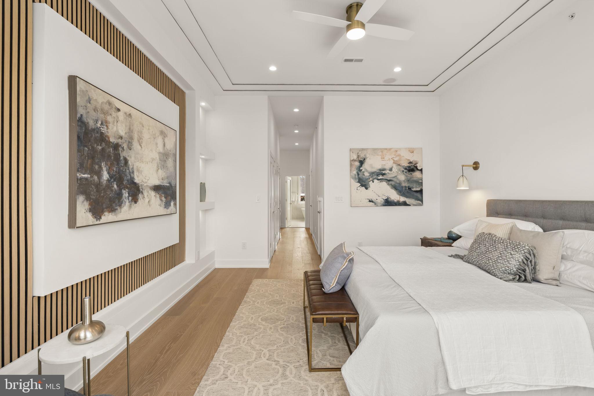 503 Winton Street Philadelphia, PA 19148 - Photo 50 of 65 a bedroom with a bed and a painting on the wall