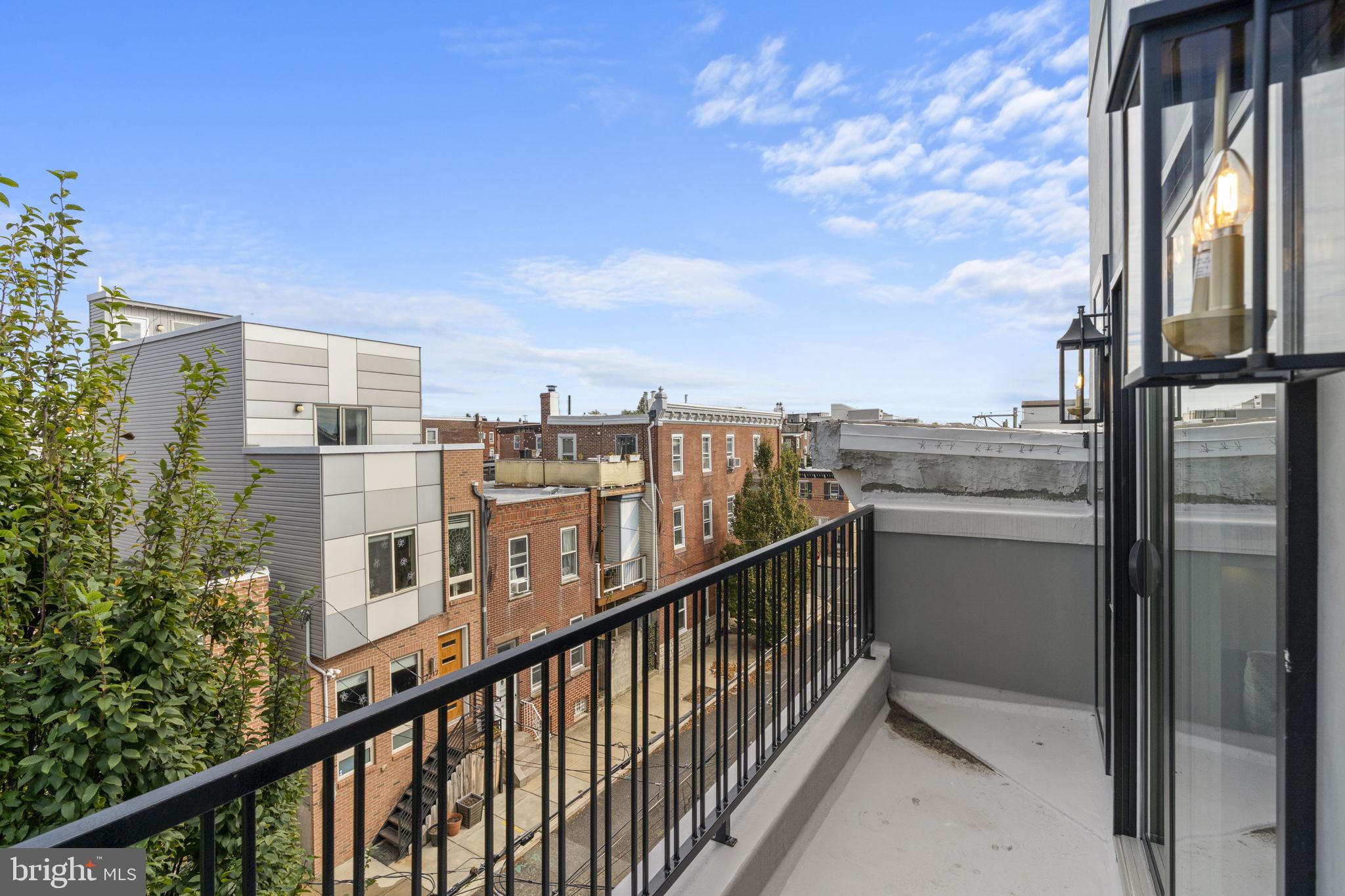 503 Winton Street Philadelphia, PA 19148 - Photo 52 of 65 a view of a balcony with city view