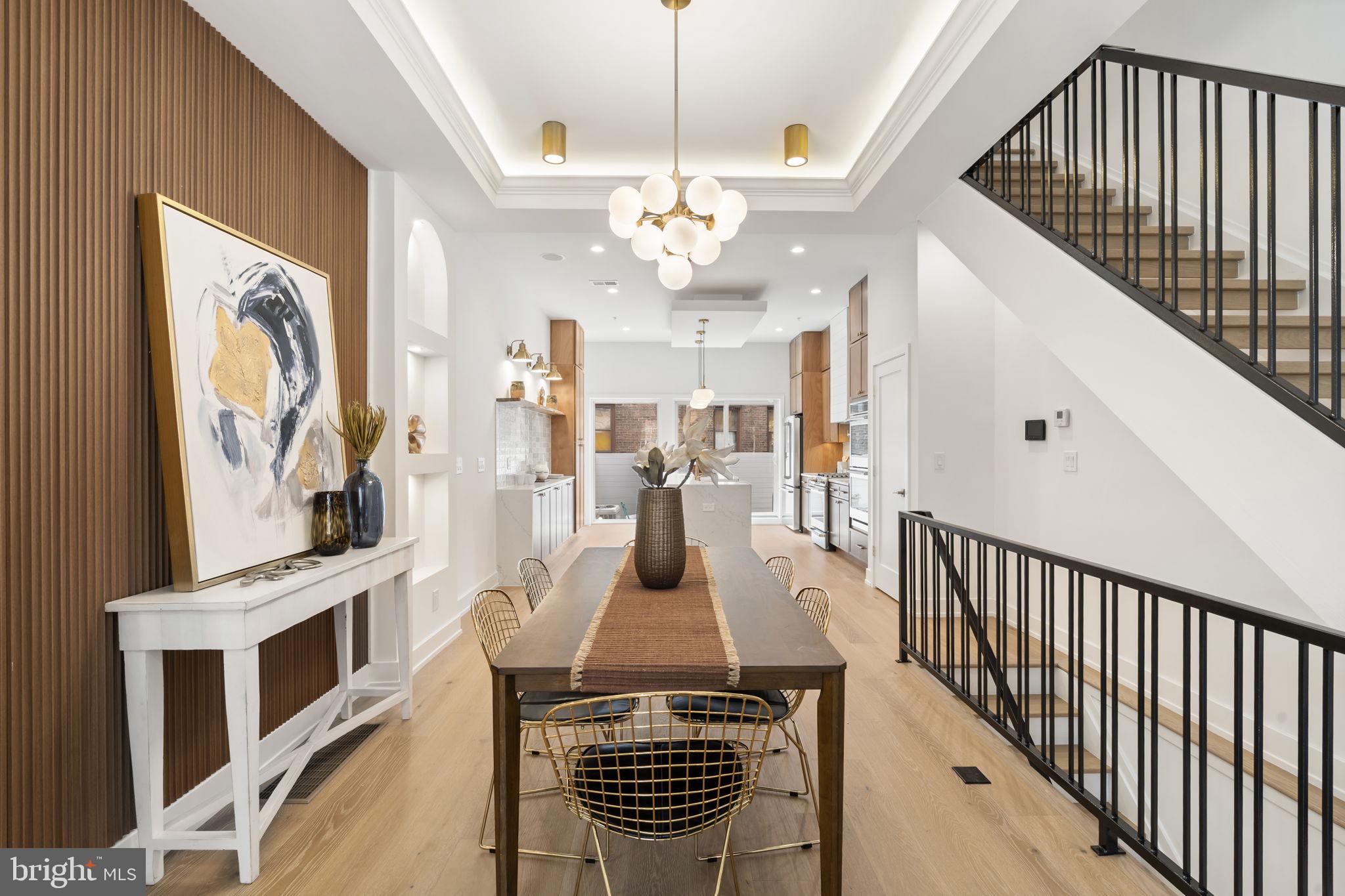 503 Winton Street Philadelphia, PA 19148 - Photo 6 of 65 a view of a living room and a kitchen with furniture