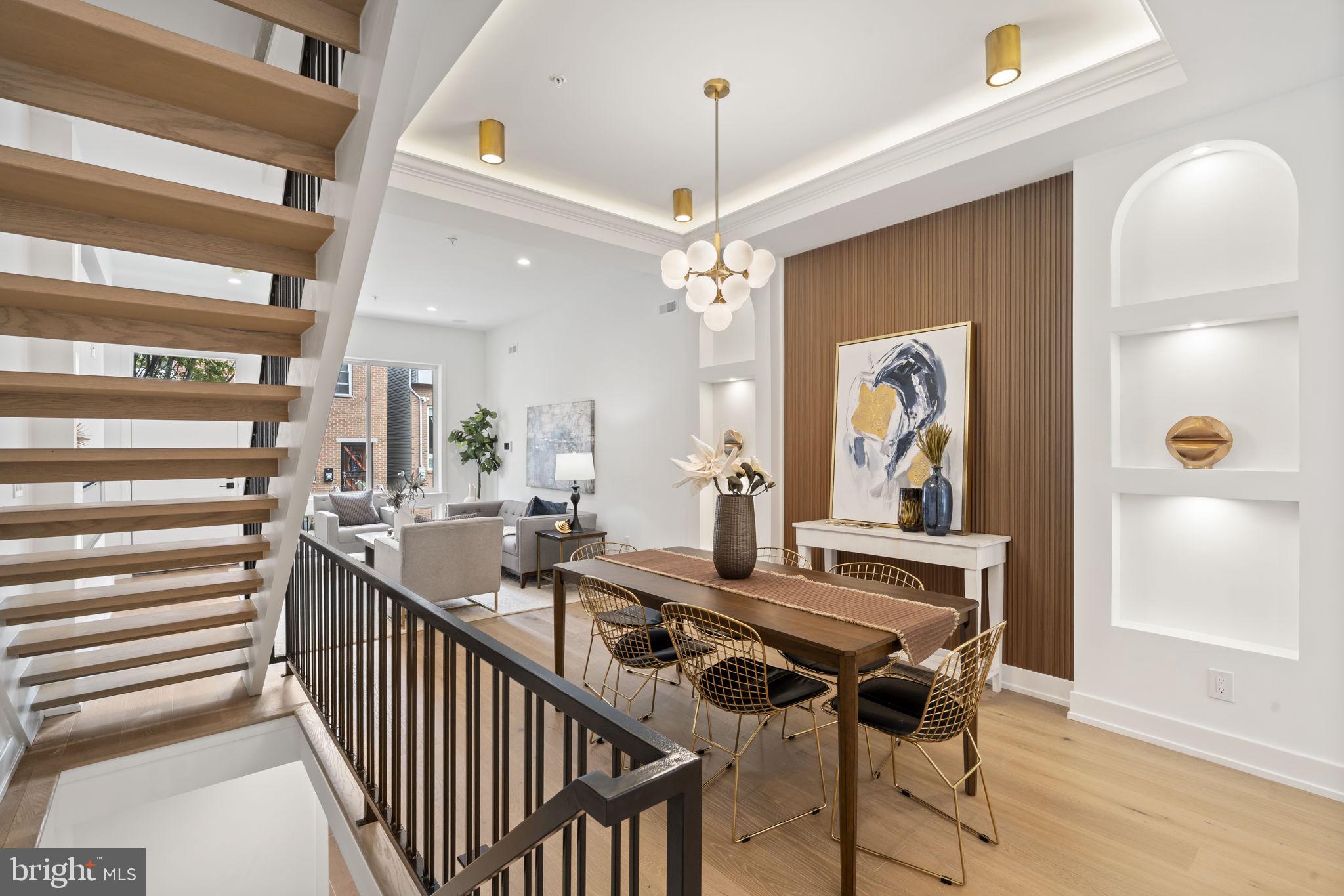 503 Winton Street Philadelphia, PA 19148 - Photo 9 of 65 a view of a dining room with furniture and a chandelier