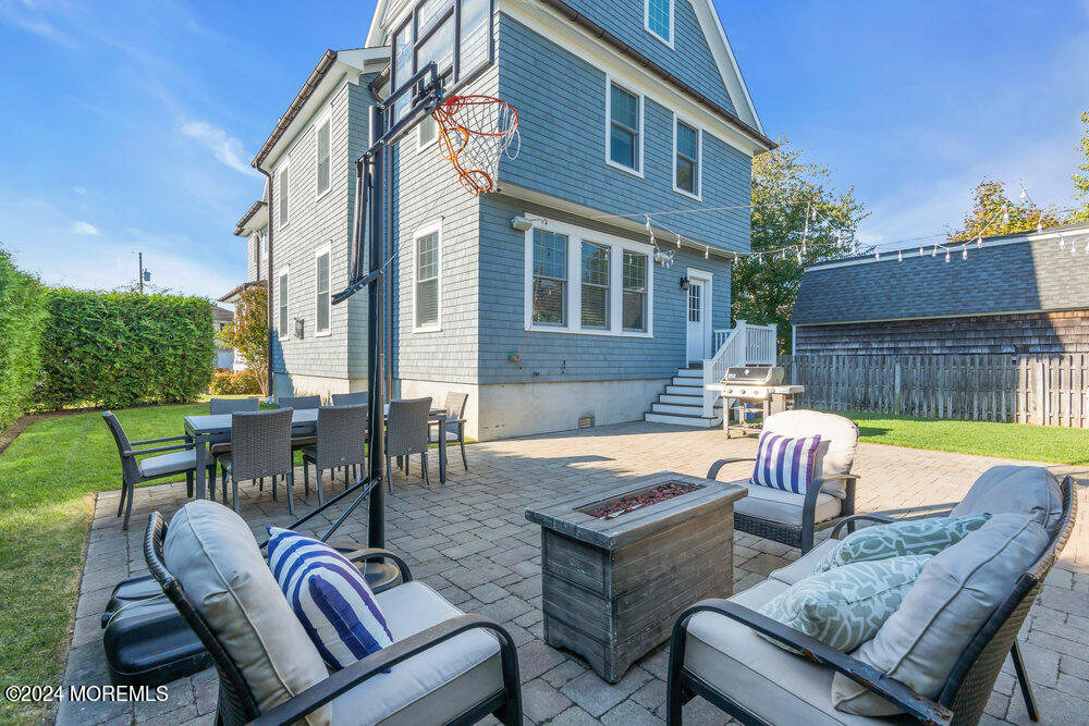 300 Salem Avenue Spring Lake, NJ 07762 - Photo 52 of 52 a view of a patio with couches table and chairs