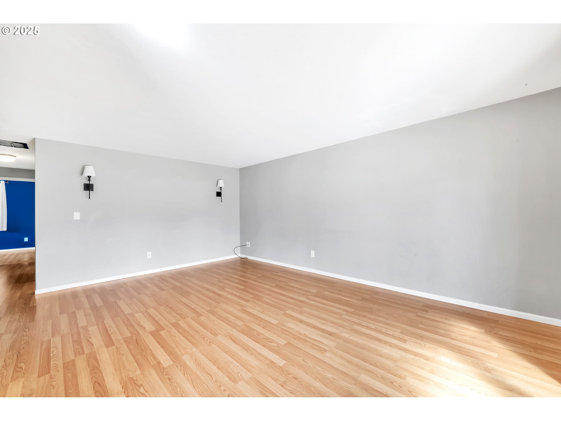 6781 F Street Springfield, OR 97478 - Photo 19 of 48 a view of an empty room and wooden floor