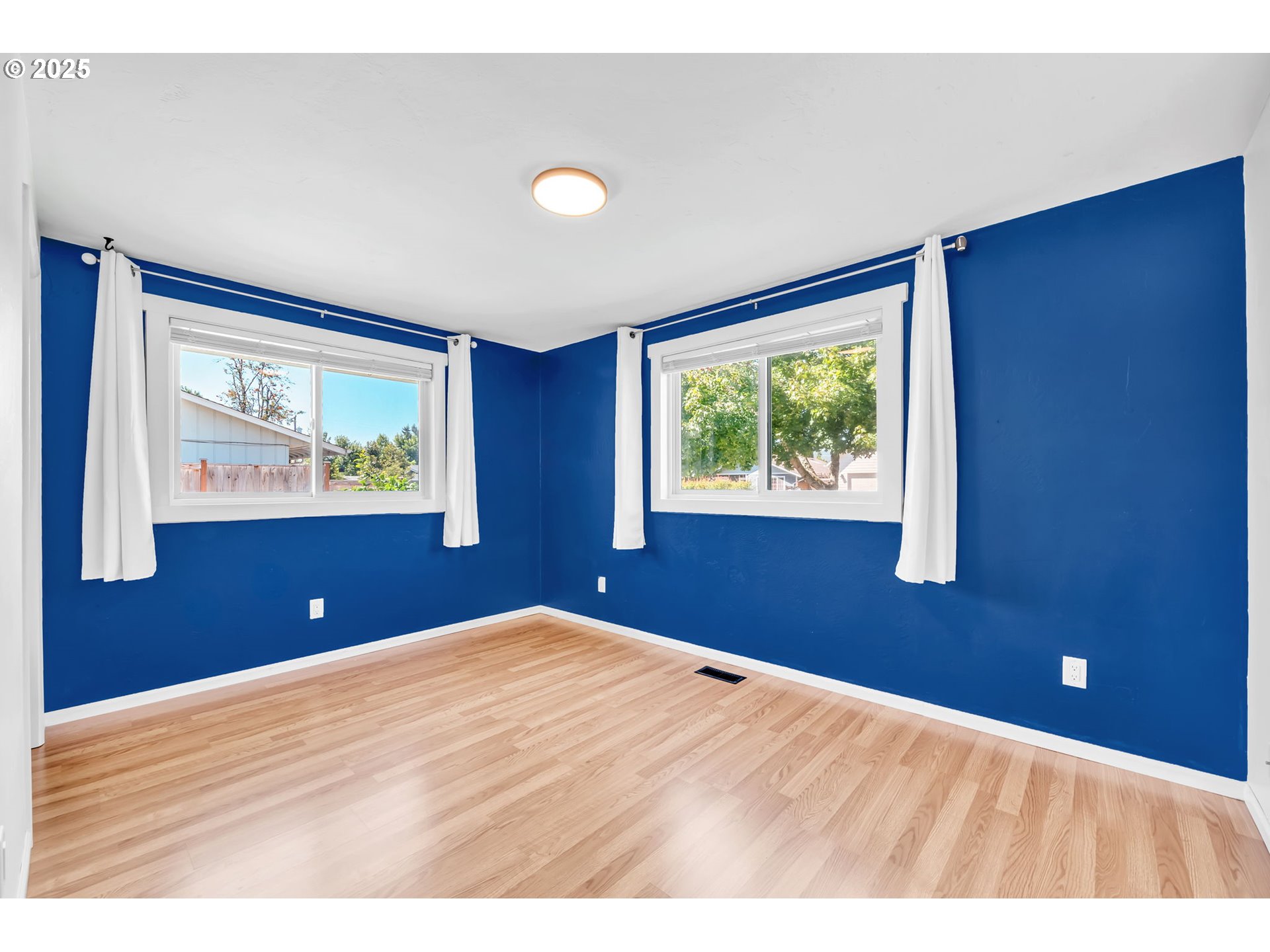 6781 F Street Springfield, OR 97478 - Photo 28 of 48 a view of empty room with window and ceiling fan