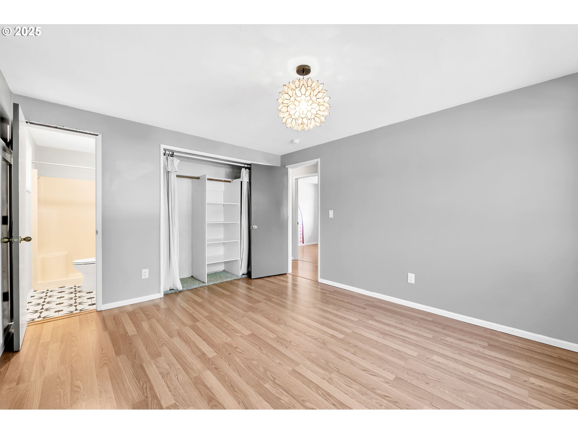 6781 F Street Springfield, OR 97478 - Photo 32 of 48 a view of an empty room with wooden floor