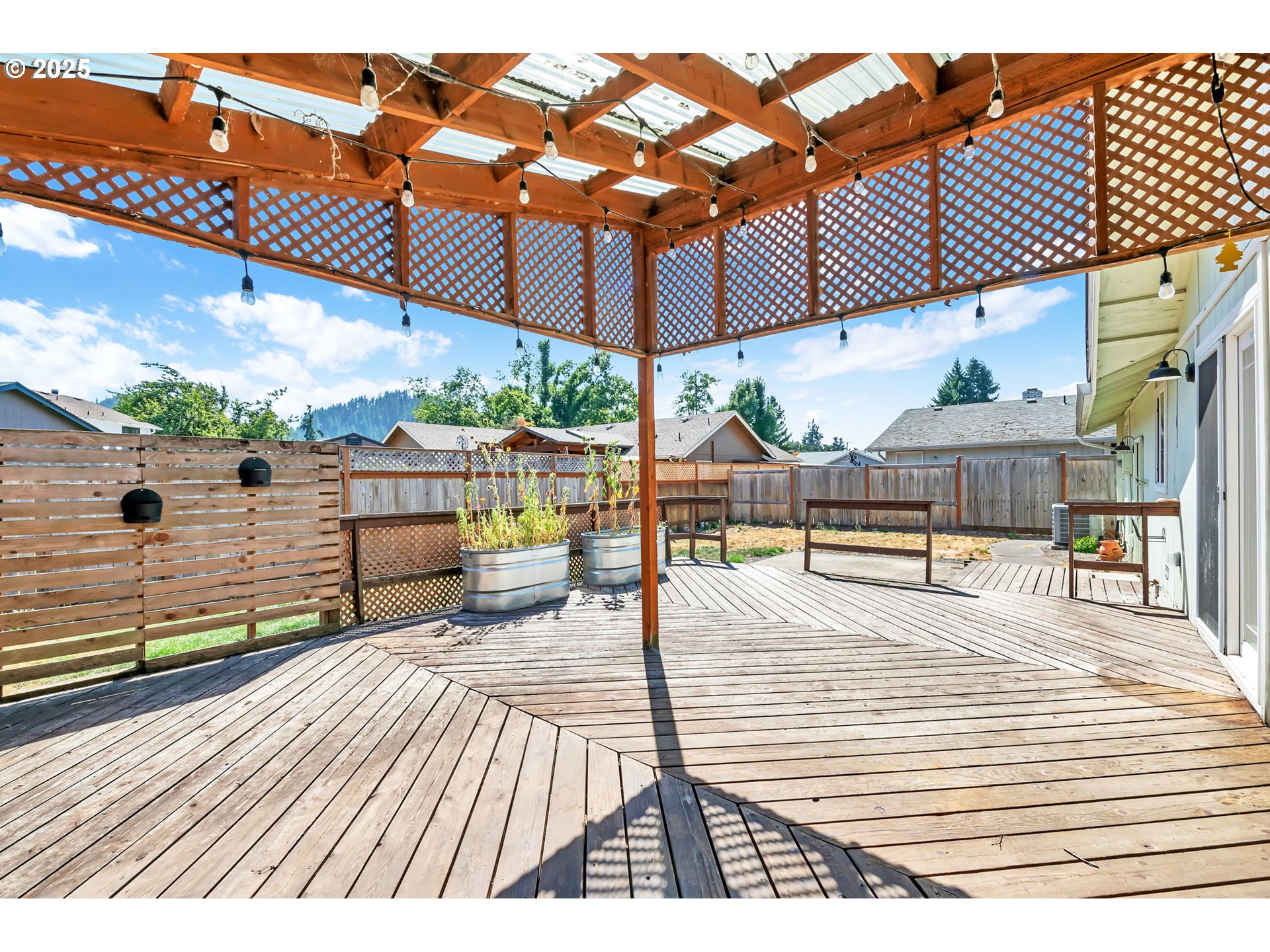 6781 F Street Springfield, OR 97478 - Photo 34 of 48 a view of a patio with a table and chairs