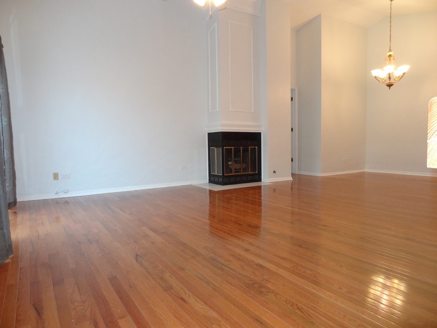 450 Bridle Trail, Unit 450 Wheeling, IL 60090 - Photo 4 of 15 a view of a livingroom with wooden floor