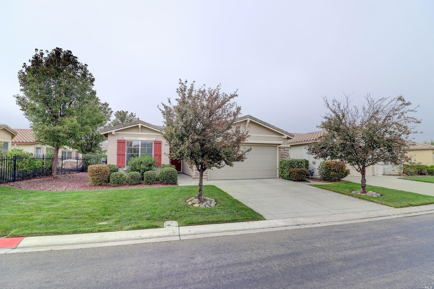 front of home with mature landscaping