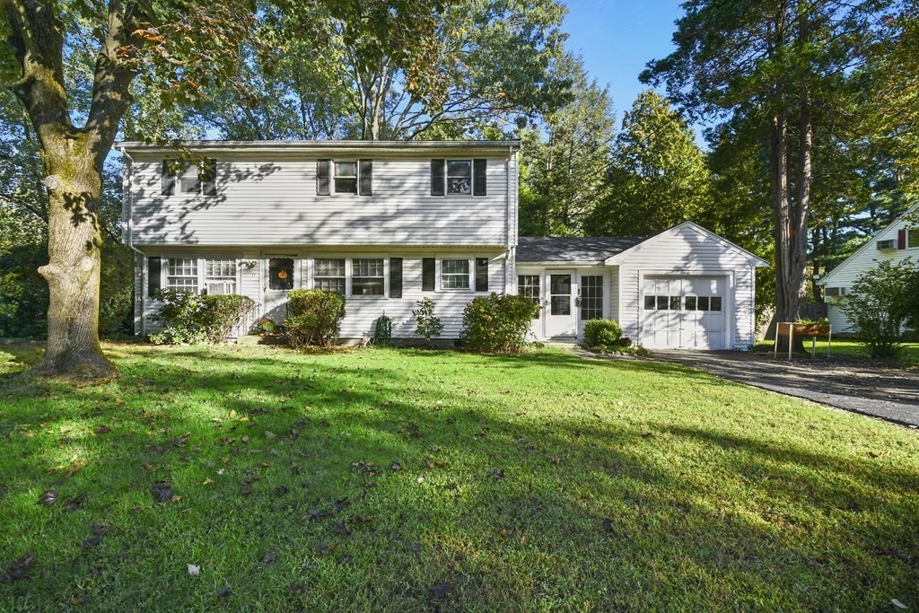 57 Davidson Road Framingham, MA 01701 - Photo 1 of 28 a front view of a house with garden