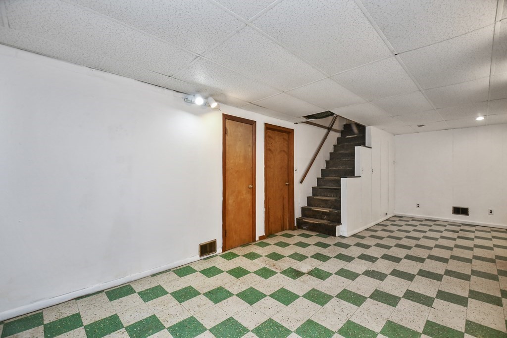 57 Davidson Road Framingham, MA 01701 - Photo 23 of 28 a bedroom with a bed and a walk in closet
