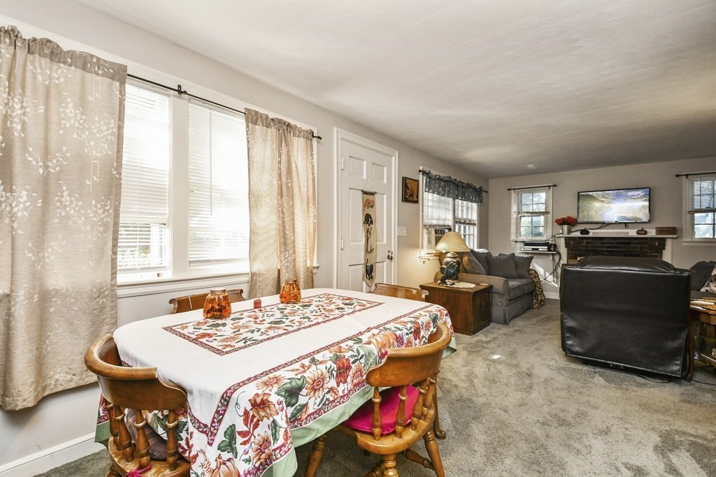 57 Davidson Road Framingham, MA 01701 - Photo 6 of 28 a bedroom with a bed and wooden floor