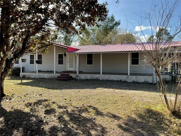 a front view of house with yard