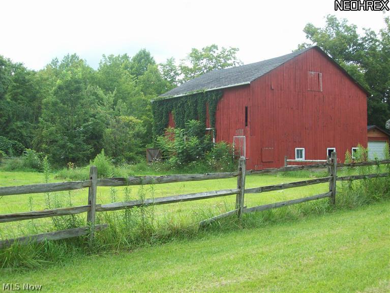 2559 Barnum Road Geneva, OH 44041 - Photo 2 of 22 Large Timber frame barm with a couple of stalls and pasture (needs a little tlc).